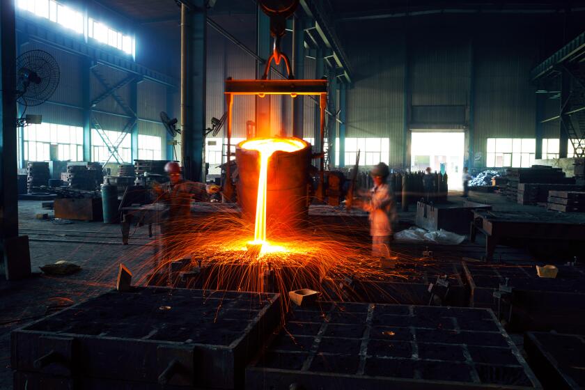 Pouring of liquid metal in open hearth workshop. Image shot 09/2012. Exact date unknown.