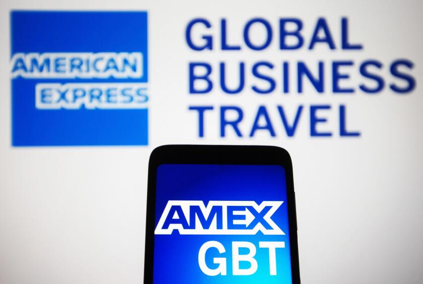 Ukraine. 03rd Dec, 2021. In this photo illustration, American Express Global Business Travel (GBT) or AmEx Global Business Travel logo is seen displayed on a smartphone and a computer screen. Credit: SOPA Images Limited/Alamy Live News