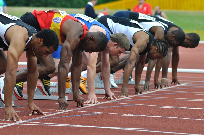 Runners on the start line of sprint race. Image shot 06/2009. Exact date unknown.