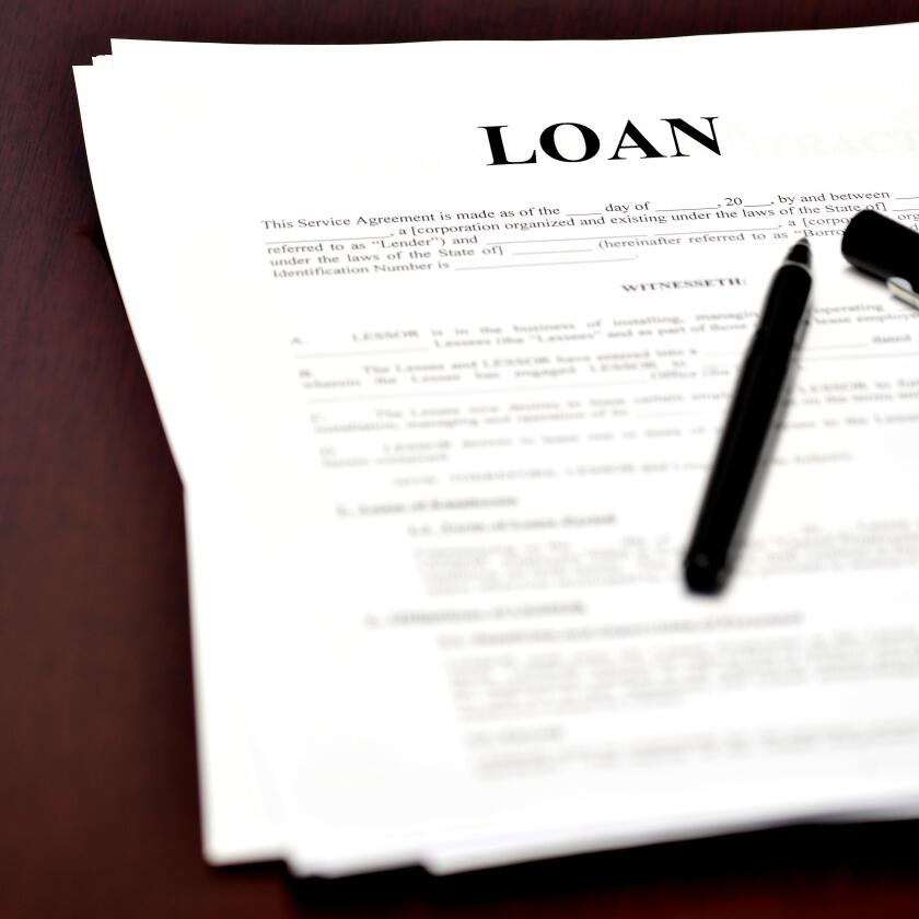 Loan document and agreement with pen for signing