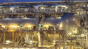 Giant container in Chemical factory at night. Petrochemical background.