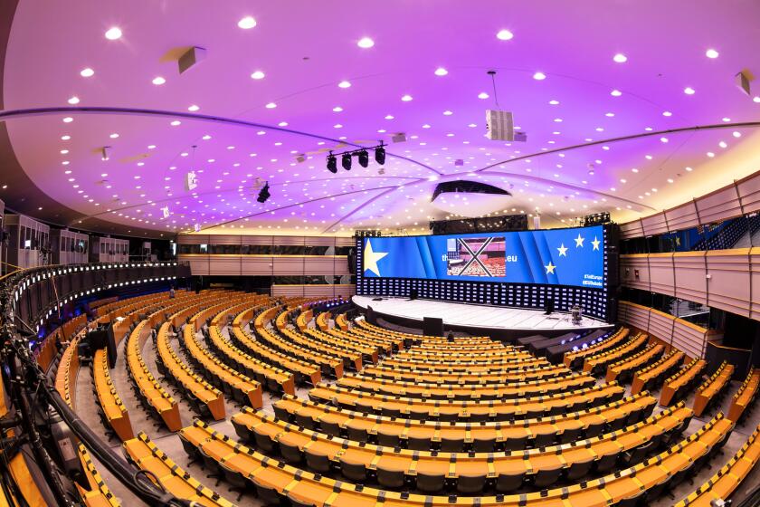 The hemicycle interior or eu parliament chamber, plenary chamber, gallery of the European Parliament building Brussels Belgium Eu Europe
