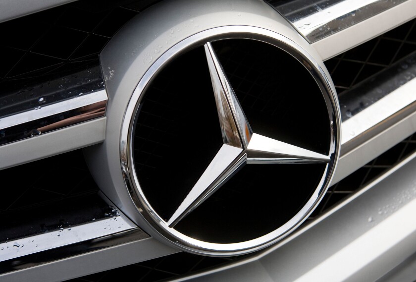 A Mercedes- Benz car dealership. 
