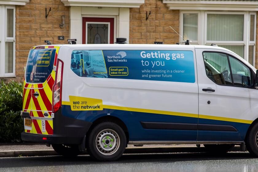 Northern Gas Network van outside homes on a modern housing development in Northowram, West Yorkshire, UK. Northern Gas Networks Limited is the British company responsible for distributing gas to homes and businesses across Yorkshire, the North East and no
