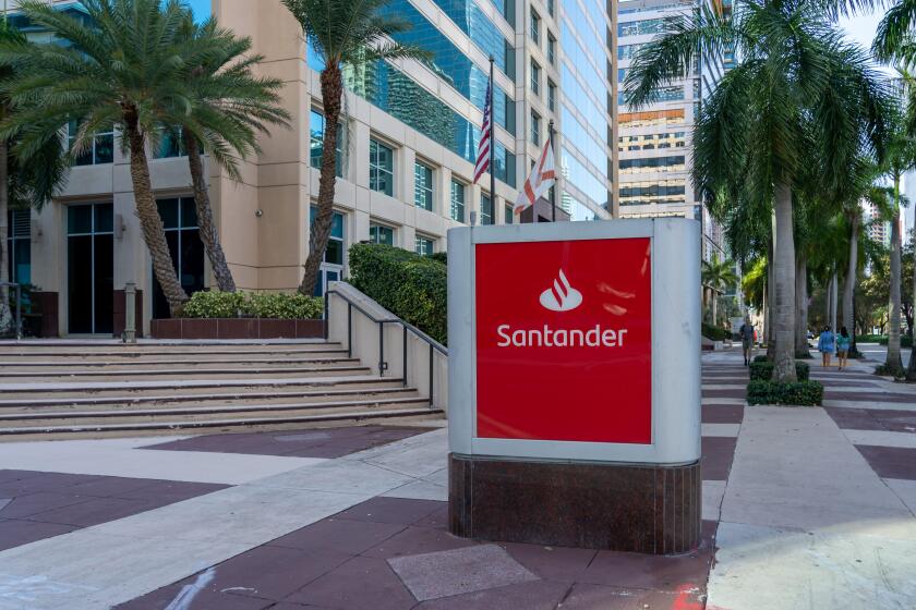 Miami, Fl, USA - January 2, 2022: The sign for a Santander Bank branch in Miami, Fl, USA.
