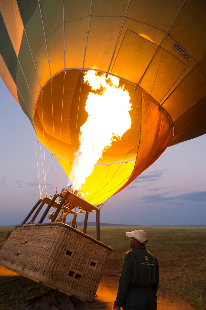 Filling the balloon with hot air before take off, balloon safari, Serengeti National Park, Tanzania