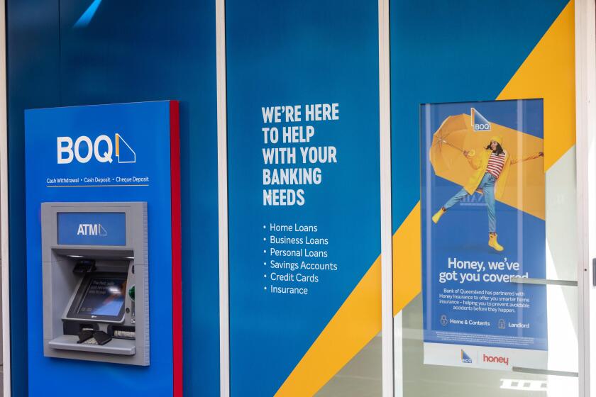 Bank of Queensland BOQ bank branch in Sydney Australia with outside ATM machine