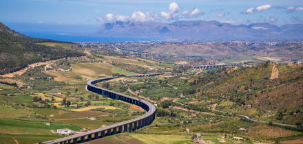 The Autostrade as it winds its way along the North Sicilian coast from the Greek Theater at Segesta, Sicily