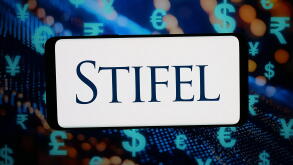 In this photo illustration, the logo of US investment company Stifel Financial Corp. is displayed on a smartphone in front of abstract background on computer screen. (Photo by Timon Schneider / SOPA Images/Sipa USA) *** Strictly for editorial news purpose