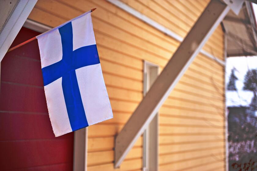 House with a flag in Finland