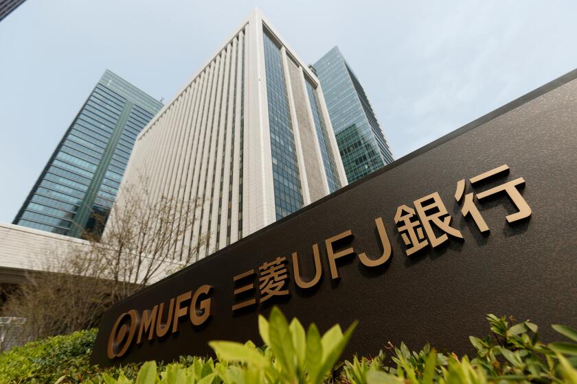 A new signboard of MUFG on display outside its building on April 2, 2018, Tokyo, Japan. Mitsubishi UFJ Financial Group Inc. changed the name of Bank of Tokyo-Mitsubishi UFJ to MUFG Bank after 11 years of merger and complaints from customers saying that th